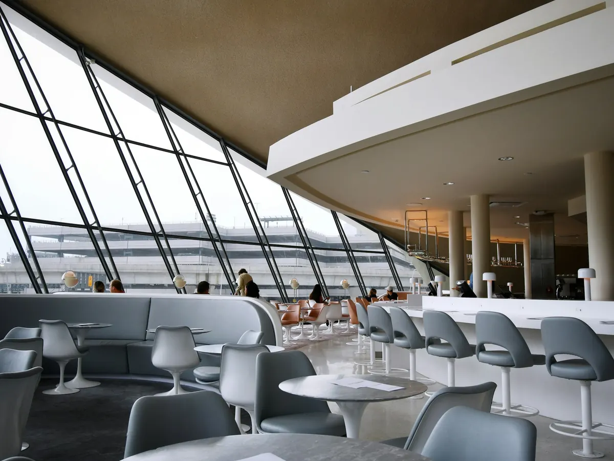 Bright private terminal lounge beside the runway